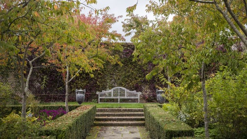 Orange, brown and green colours in the rose garden at Sissinghurst